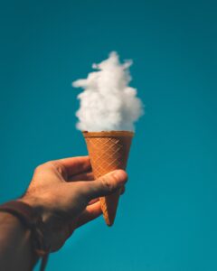 Photo by Rakicevic Nenad: https://www.pexels.com/photo/man-holding-ice-cream-cone-under-cloud-1262302/